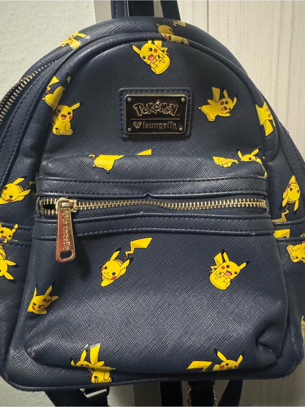 Loungefly Navy Mini Backpack with Yellow Pikachu Print